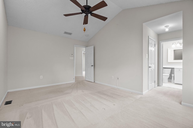 13 Honey Locust Ln, Newtown, PA 18940 - unfurnished bedroom with vaulted ceiling, light colored carpet, connected bathroom, and baseboards