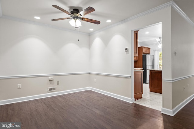 13 Honey Locust Ln, Newtown, PA 18940 - spare room featuring a ceiling fan, wood finished floors, recessed lighting, baseboards, and crown molding