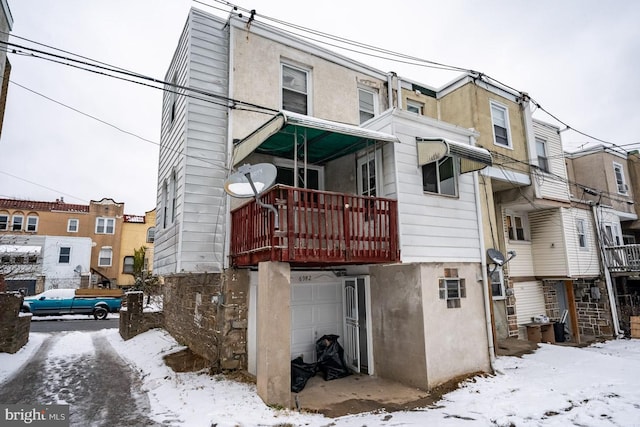 6982 Clinton Rd, Upper Darby, PA 19082 - snow covered back of property featuring stucco siding