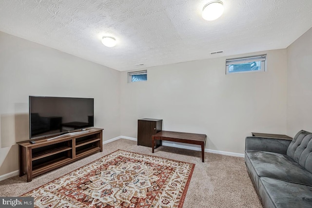 3218 Water Lily Ct, Laurel, MD 20724 - living area featuring plenty of natural light, carpet, and a textured ceiling