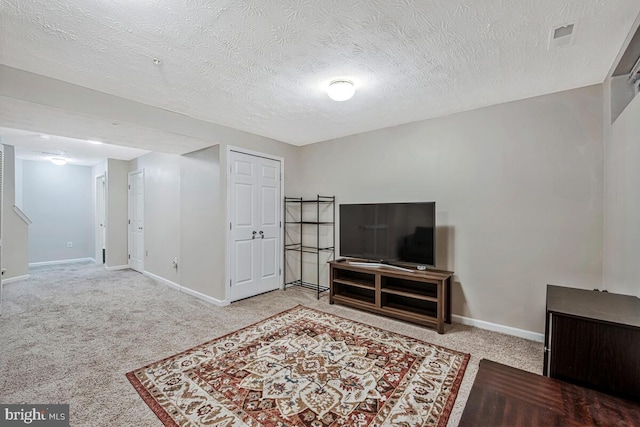 3218 Water Lily Ct, Laurel, MD 20724 - living room featuring carpet flooring, baseboards, and a textured ceiling