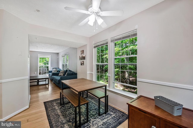 3218 Water Lily Ct, Laurel, MD 20724 - dining area with ceiling fan, light wood finished floors, baseboards, and a textured ceiling
