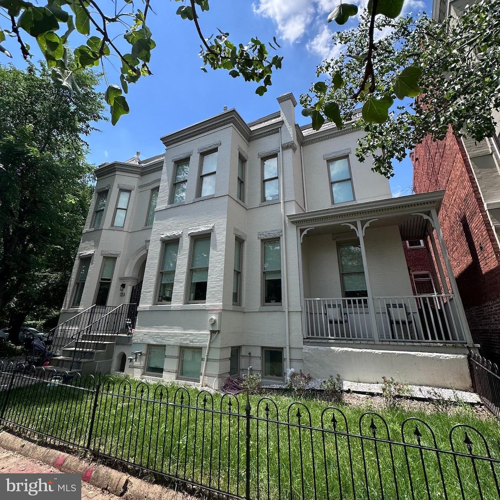 123 13th St SE, Washington, DC 20003 - multi unit property featuring covered porch and a fenced front yard