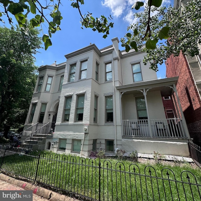 123 13th St SE, Washington, DC 20003 - multi unit property featuring covered porch and a fenced front yard