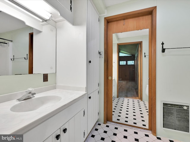 2511 W Norwegian St, Pottsville, PA 17901 - full bath featuring heating unit, vanity, and tile patterned flooring
