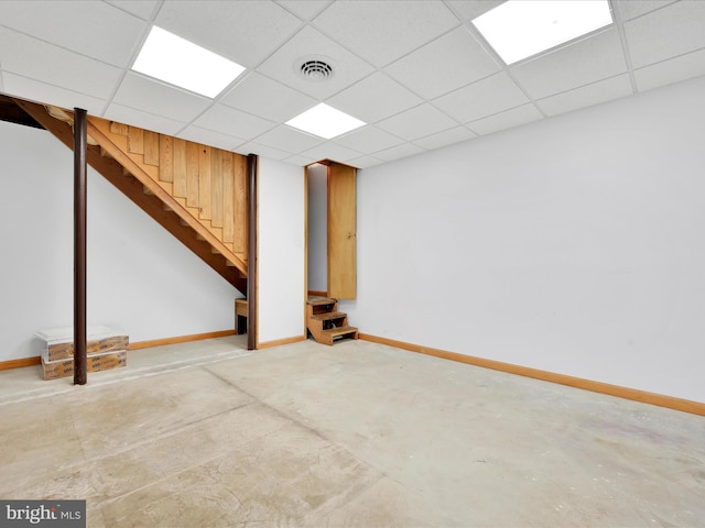 2511 W Norwegian St, Pottsville, PA 17901 - finished below grade area with baseboards, stairway, and a paneled ceiling