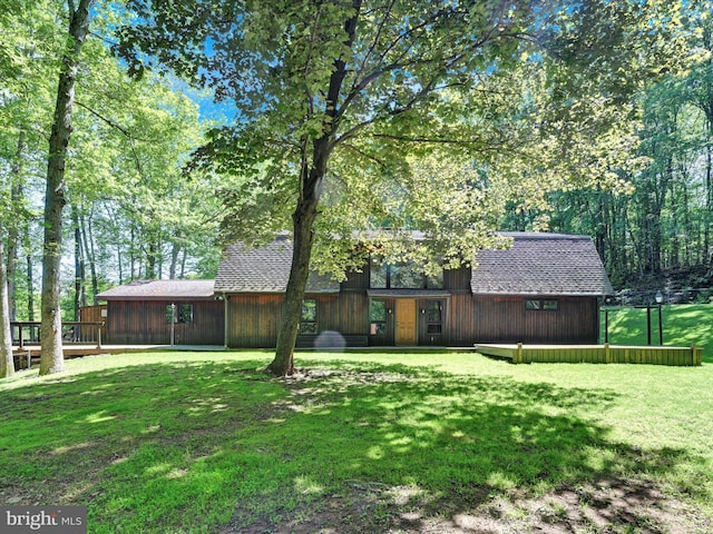 2511 W Norwegian St, Pottsville, PA 17901 - rear view of property with a lawn and roof with shingles