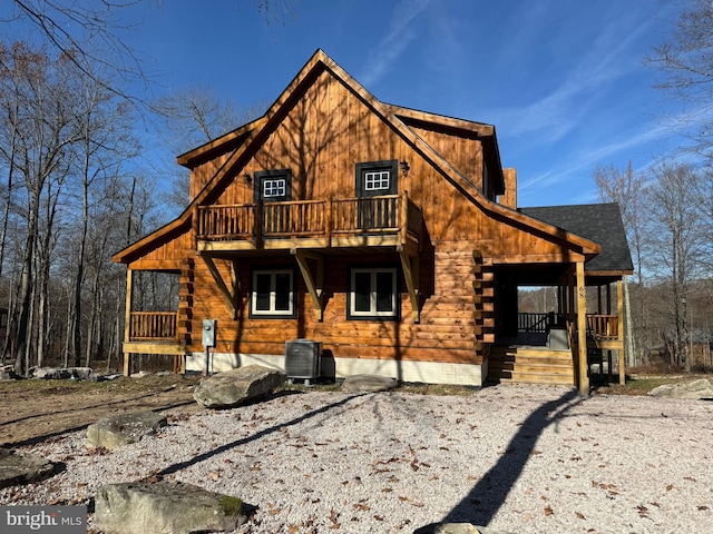 68 Taylor Ln, Mc Henry, MD 21541 - rear view of house with log siding, central AC, a shingled roof, and a porch