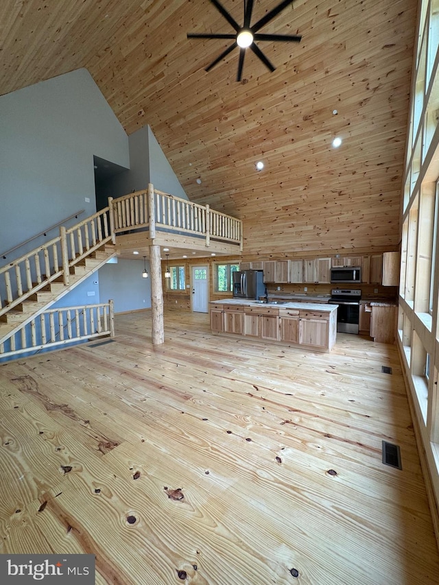 68 Taylor Ln, Mc Henry, MD 21541 - unfurnished living room featuring high vaulted ceiling, ceiling fan, light wood-style flooring, stairs, and wooden ceiling