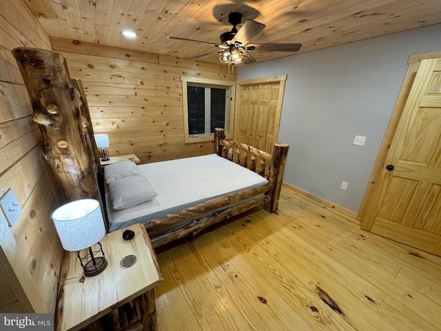 68 Taylor Ln, Mc Henry, MD 21541 - bedroom with wood finished floors, wooden ceiling, a ceiling fan, wooden walls, and baseboards