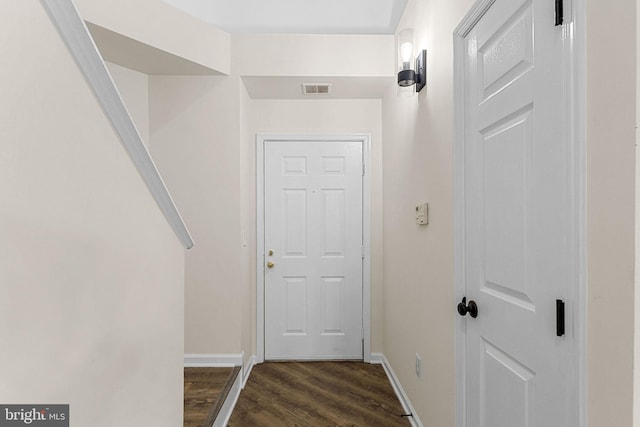 5948 Founders Hill Dr Unit 301, Alexandria, VA 22310 - doorway featuring dark wood-style flooring and baseboards
