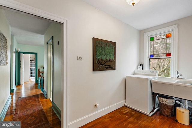 127 Webster Ave, Wyncote, PA 19095 - laundry room featuring washer / dryer, dark wood finished floors, and baseboards
