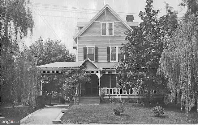 127 Webster Ave, Wyncote, PA 19095 - victorian home with covered porch and a chimney