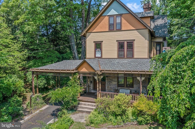 127 Webster Ave, Wyncote, PA 19095 - victorian house featuring a chimney and stone siding