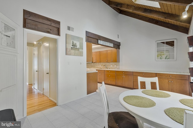 11174 Glade Dr, Reston, VA 20191 - dining area featuring wooden ceiling and light tile patterned floors