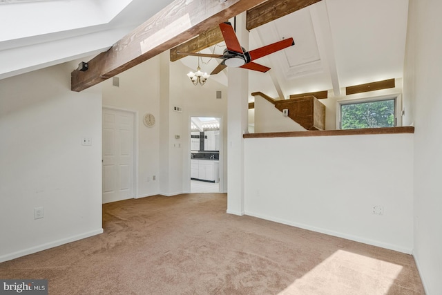11174 Glade Dr, Reston, VA 20191 - unfurnished living room featuring carpet, beam ceiling, a chandelier, baseboards, and high vaulted ceiling