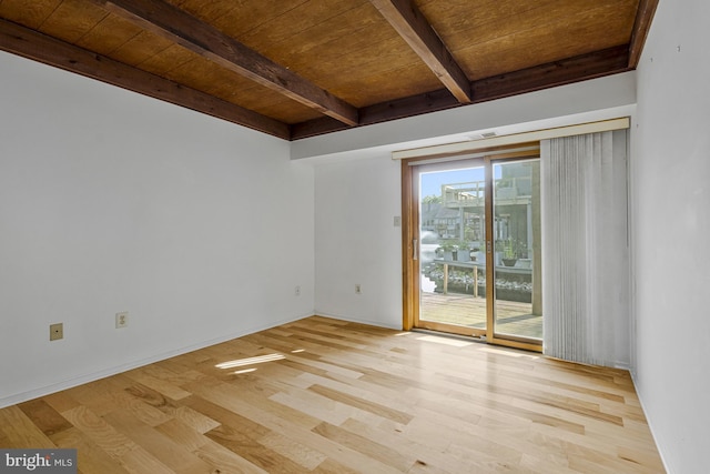 11174 Glade Dr, Reston, VA 20191 - spare room featuring wood ceiling with exposed beams, wood finished floors, and baseboards