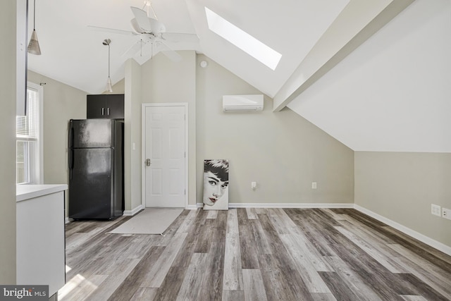 11174 Glade Dr, Reston, VA 20191 - bonus room featuring lofted ceiling, a skylight, ceiling fan, light wood-style floors, and a wall unit AC