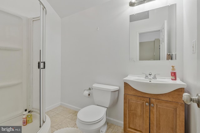 11174 Glade Dr, Reston, VA 20191 - full bathroom with vanity, a stall shower, toilet, and baseboards
