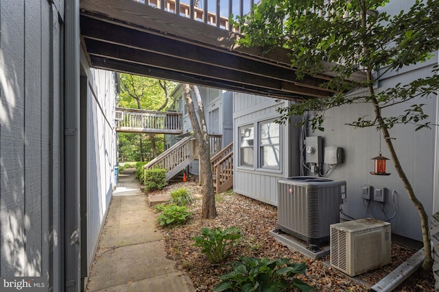 11174 Glade Dr, Reston, VA 20191 - view of side of home with cooling unit and stairway