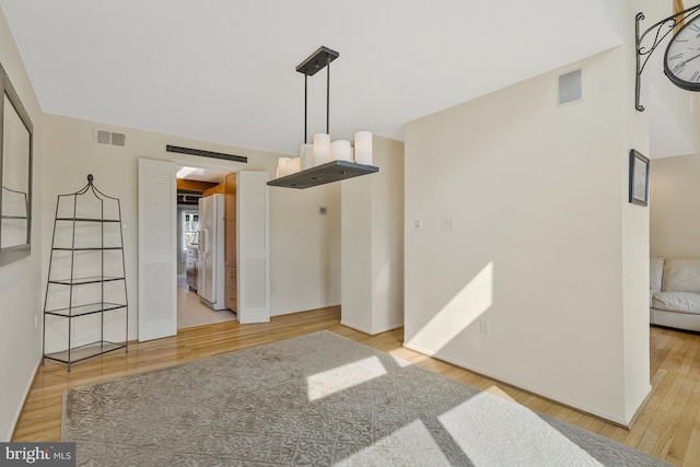 11174 Glade Dr, Reston, VA 20191 - unfurnished living room featuring wood finished floors