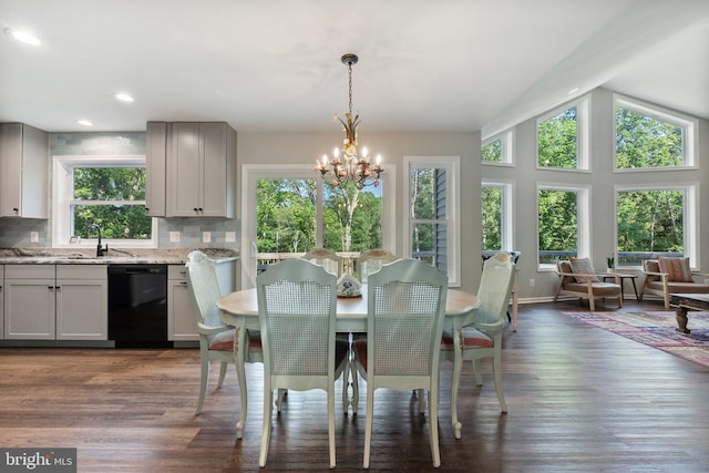 1820 Gooney Manor Loop, Bentonville, VA 22610 - dining area featuring a chandelier, wood finished floors, vaulted ceiling, recessed lighting, and baseboards