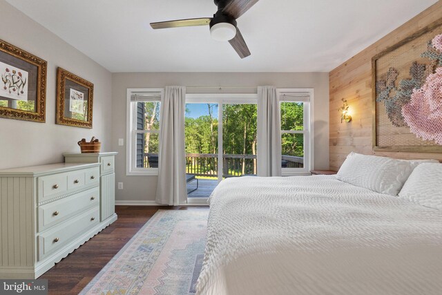 1820 Gooney Manor Loop, Bentonville, VA 22610 - bedroom with access to exterior, wooden walls, dark wood-style flooring, baseboards, and ceiling fan