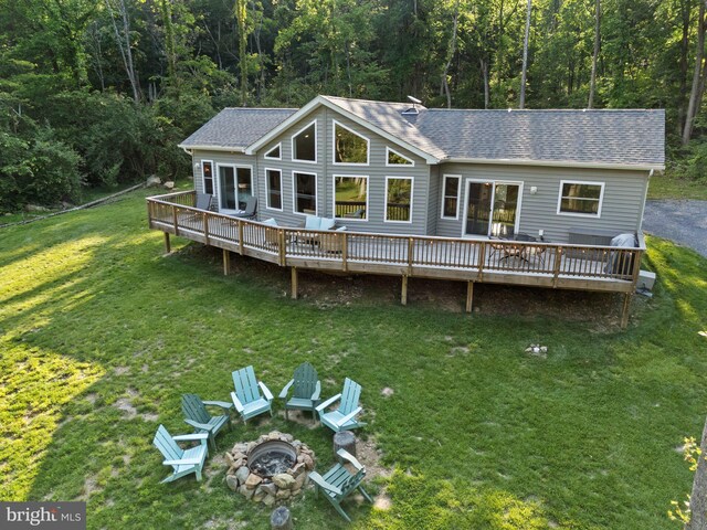 1820 Gooney Manor Loop, Bentonville, VA 22610 - rear view of property with an outdoor fire pit, a deck, and roof with shingles