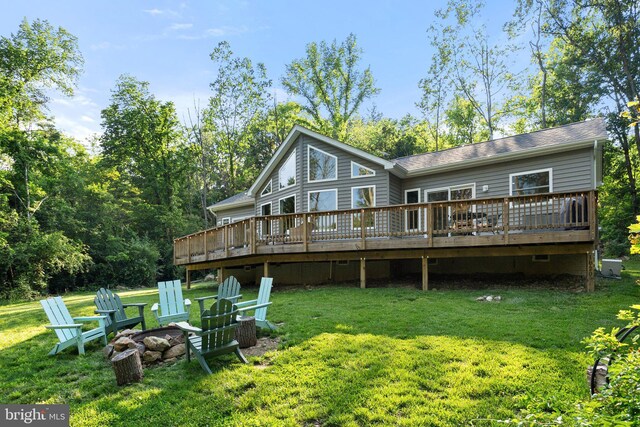 1820 Gooney Manor Loop, Bentonville, VA 22610 - rear view of property with a fire pit, a wooden deck, a lawn, and roof with shingles