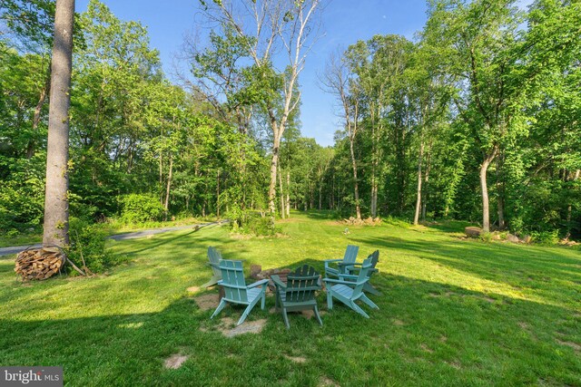 1820 Gooney Manor Loop, Bentonville, VA 22610 - view of green lawn with an outdoor fire pit