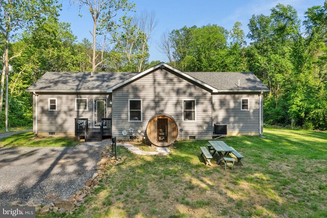 1820 Gooney Manor Loop, Bentonville, VA 22610 - rear view of property featuring crawl space, central AC unit, a yard, and roof with shingles