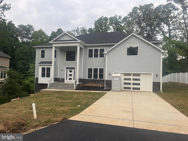 7215 Oriole Ave, Springfield, VA 22150 - view of front of property with an attached garage, concrete driveway, and stone siding