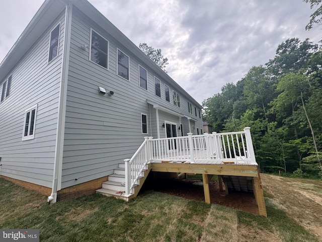 7215 Oriole Ave, Springfield, VA 22150 - back of property with a deck, a yard, and stairs