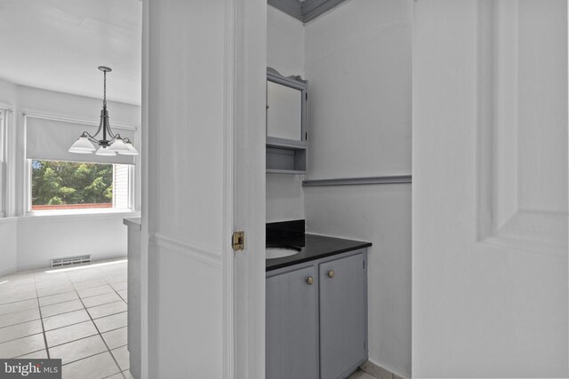 26 Crestview Dr, Southampton, PA 18966 - bar area featuring decorative light fixtures and light tile patterned floors
