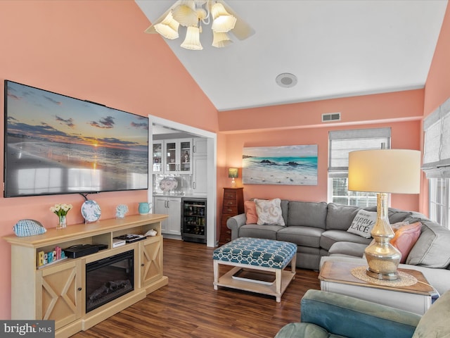 132 Seabright Way Unit D5, Rehoboth Beach, DE 19971 - living area featuring beverage cooler, dark wood-style flooring, bar area, high vaulted ceiling, and ceiling fan
