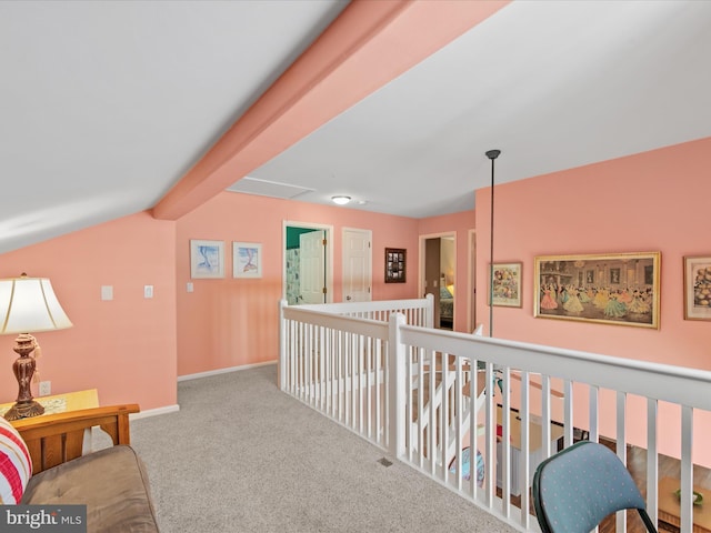 132 Seabright Way Unit D5, Rehoboth Beach, DE 19971 - corridor with carpet flooring, baseboards, and lofted ceiling