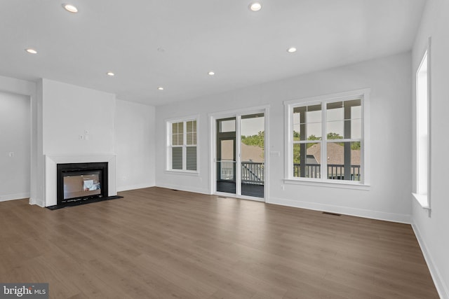 19 Gentle Slope Way, Gettysburg, PA 17325 - unfurnished living room featuring wood finished floors, plenty of natural light, and recessed lighting