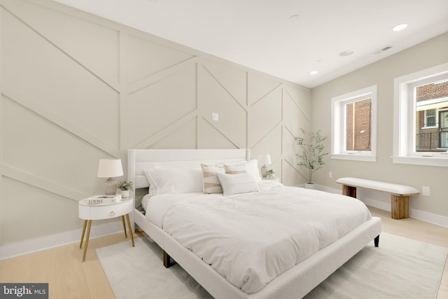 2305 Nicholson St SE Unit 305, Washington, DC 20020 - bedroom featuring baseboards, recessed lighting, and light wood finished floors