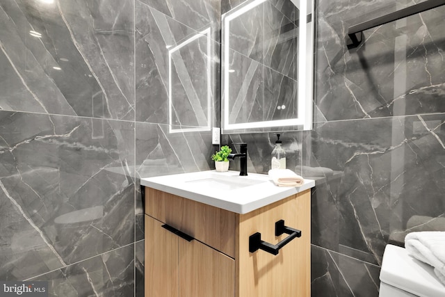 2305 Nicholson St SE Unit 305, Washington, DC 20020 - bathroom with tile walls and vanity