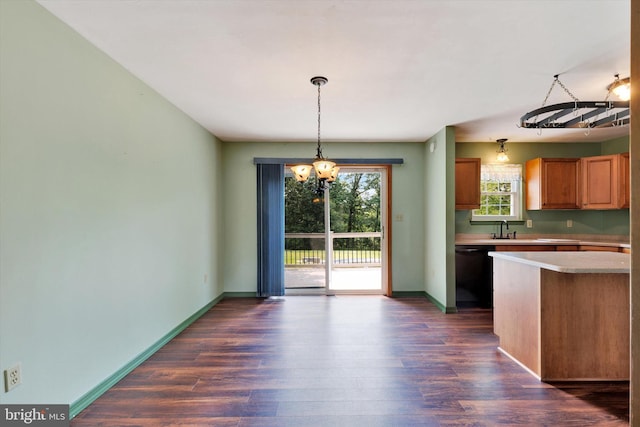 425 Appaloosa Way, Red Lion, PA 17356 - kitchen featuring black dishwasher, a chandelier, dark wood-style flooring, light countertops, and pendant lighting