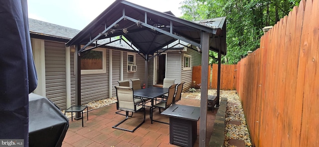 453 Mountain Heights Rd, Front Royal, VA 22630 - fenced backyard featuring outdoor dining space, a patio, a gazebo, and cooling unit