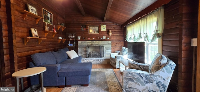453 Mountain Heights Rd, Front Royal, VA 22630 - living room featuring wood finished floors, wooden ceiling, a stone fireplace, and wood walls
