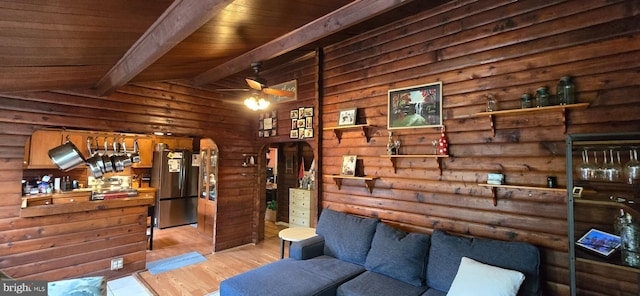 453 Mountain Heights Rd, Front Royal, VA 22630 - living room with a ceiling fan, wood finished floors, arched walkways, and wooden ceiling
