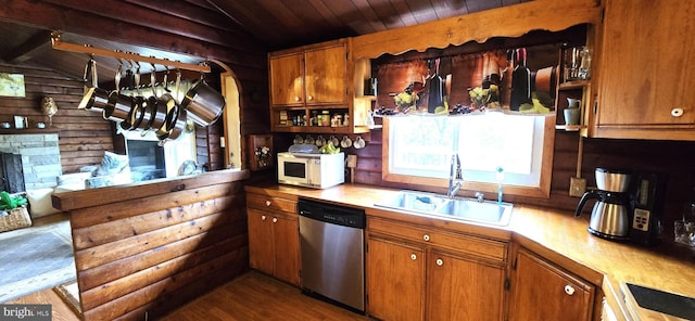 453 Mountain Heights Rd, Front Royal, VA 22630 - kitchen with dishwasher, a sink, white microwave, open shelves, and lofted ceiling