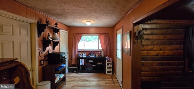 453 Mountain Heights Rd, Front Royal, VA 22630 - entrance foyer with light wood-style floors, a textured ceiling, and stairs