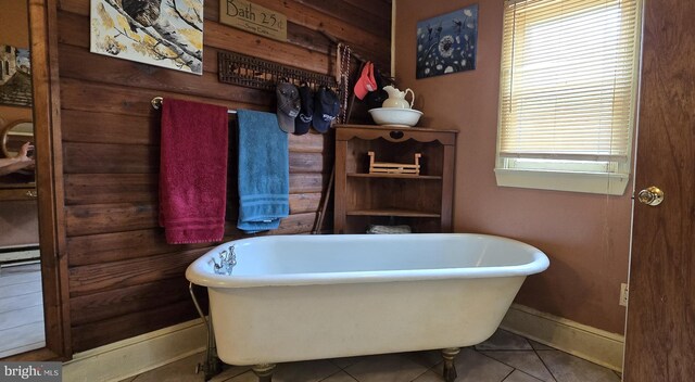 453 Mountain Heights Rd, Front Royal, VA 22630 - bathroom with a soaking tub, baseboards, and tile patterned flooring