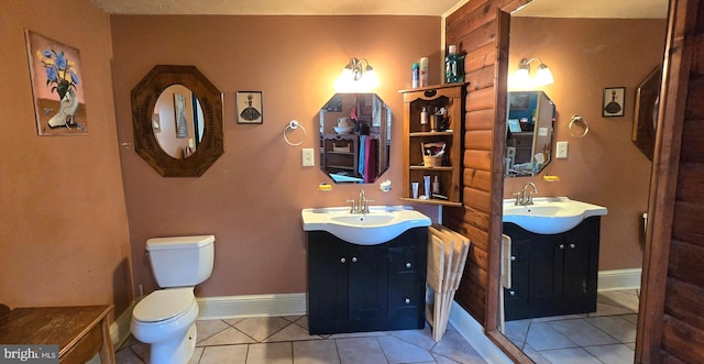 453 Mountain Heights Rd, Front Royal, VA 22630 - full bathroom with two vanities, toilet, tile patterned flooring, and baseboards