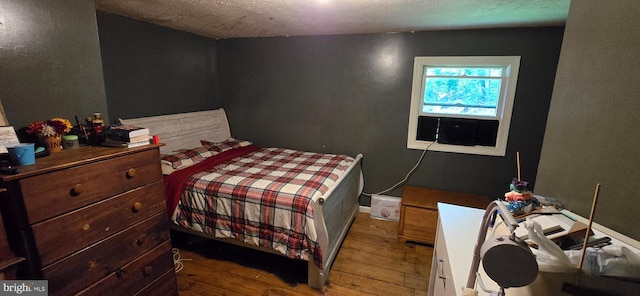 453 Mountain Heights Rd, Front Royal, VA 22630 - bedroom with hardwood / wood-style floors and a textured ceiling