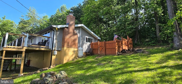 453 Mountain Heights Rd, Front Royal, VA 22630 - view of home's exterior with a deck and a chimney