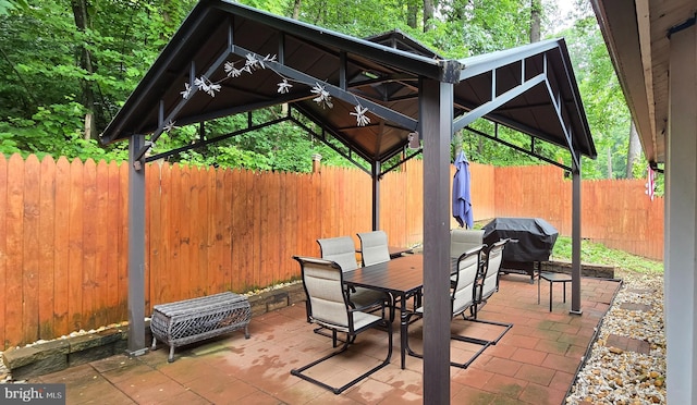 453 Mountain Heights Rd, Front Royal, VA 22630 - fenced backyard featuring a gazebo, a patio, outdoor dining space, and a grill